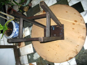 Placing the old stool onto the lazy susan top.