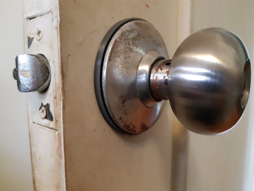 Doorknob shim on fixed doorknob